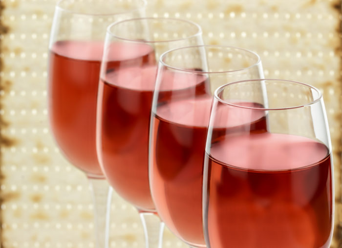 dreamstime_xxl_109855096 – 4 cups of wine, matzah background (TTTT Arvei Pesachim) (or just Pesach)